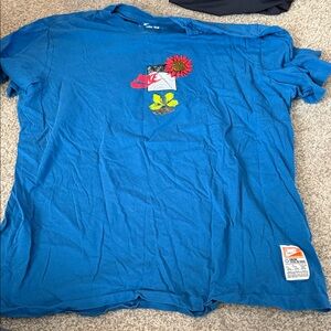 Nike Blue Tee with Floral and Swoosh Graphic